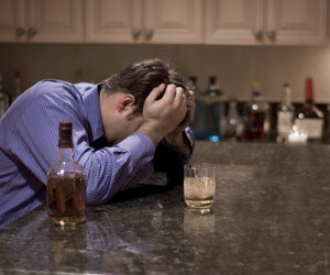 man recognizing signs of alcoholism