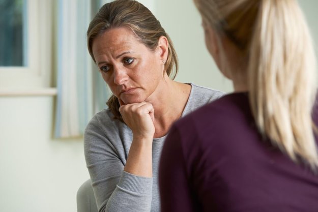 california alcohol rehab centers sad woman talking to female therapist in california alcohol rehab centers