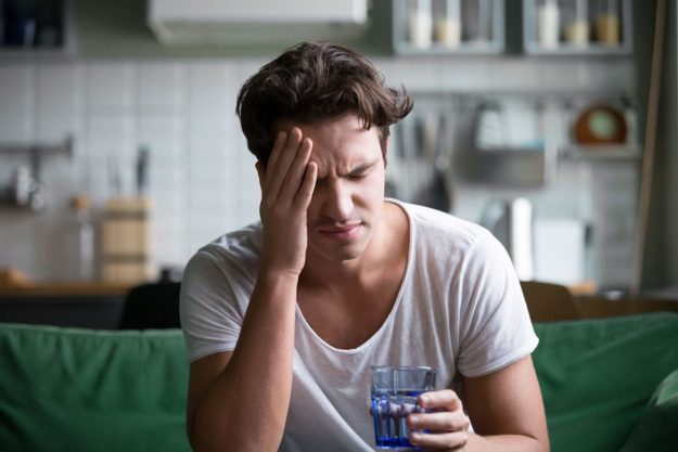 How Long is Alcohol Withdrawal_ man struggles with alcohol withdrawal symptoms